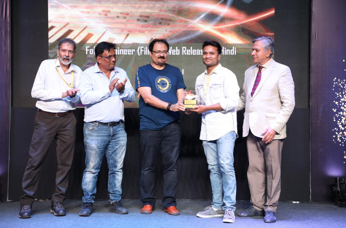 Varun Kumar Visoi receiving award for Foley Work